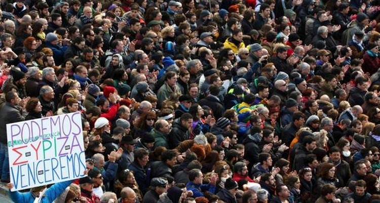Iσπανία: Xιλιάδες διαδηλωτές, ελληνικές σημαίες και πλακάτ ΣΥΡΙΖΑ κατά της λιτότητας (photos)
