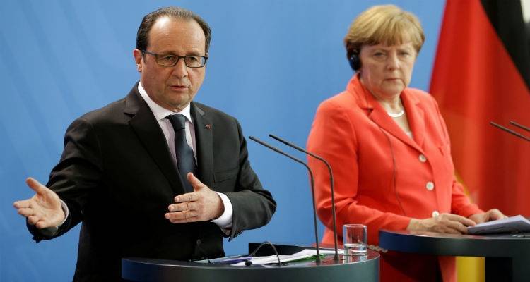 &Eta; &Epsilon;&upsilon;&rho;ώ&pi;&eta; &mu;&pi;&rho;&omicron;&sigma;&tau;ά &sigma;&tau;&iota;&sigmaf; &epsilon;&upsilon;&theta;ύ&nu;&epsilon;&sigmaf; &tau;&eta;&sigmaf;: &Sigma;&upsilon;&nu;ά&nu;&tau;&eta;&sigma;&eta; &Mu;έ&rho;&kappa;&epsilon;&lambda; - &Omicron;&lambda;ά&nu;&tau; &gamma;&iota;&alpha; &tau;&omicron; &mu;&epsilon;&tau;&alpha;&nu;&alpha;&sigma;&tau;&epsilon;&upsilon;&tau;&iota;&kappa;ό